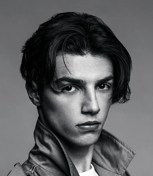 The middle part is trendy, versatile and intentional, defined by a part clean down the center