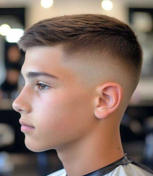 This textured French crop with a sharp mid fade is a simple, timeless style