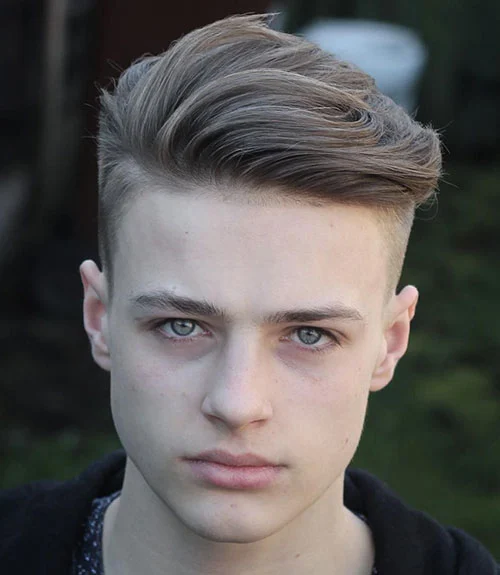 The undercut hairstyle with a longer top is all about striking contrast, combining sharp